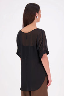 A customer favourite, the NES Cross Top is crafted in lightweight chiffon for an easy, elegant drape. This flattering t-shirt style features mid-length sleeves with folded cuffs, a soft scooped hem, and a unique crossover yoke detail that wraps from front to back. Perfect dressed up or down, and best layered with a NES Lattice Singlet underneath for coverage and style.

Our model is 174cm and wears a XS (8) NES fit advise: Standard fit

Composition: PT Chiffon

Designed and Made in New Zealand