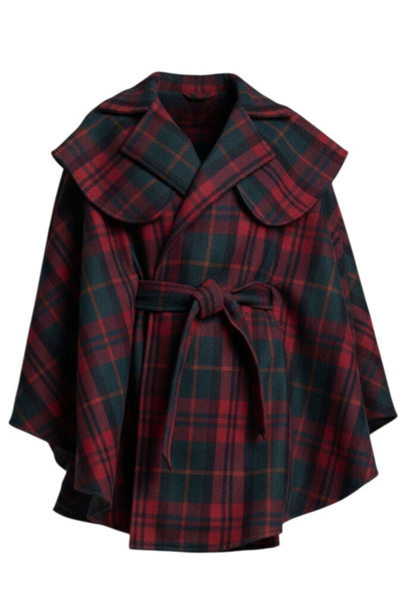 The NES Suri Cape by N-E-S – a trench-inspired wool cape with waist tie, lapel and full lining. A refined winter show stopper. NZ made.