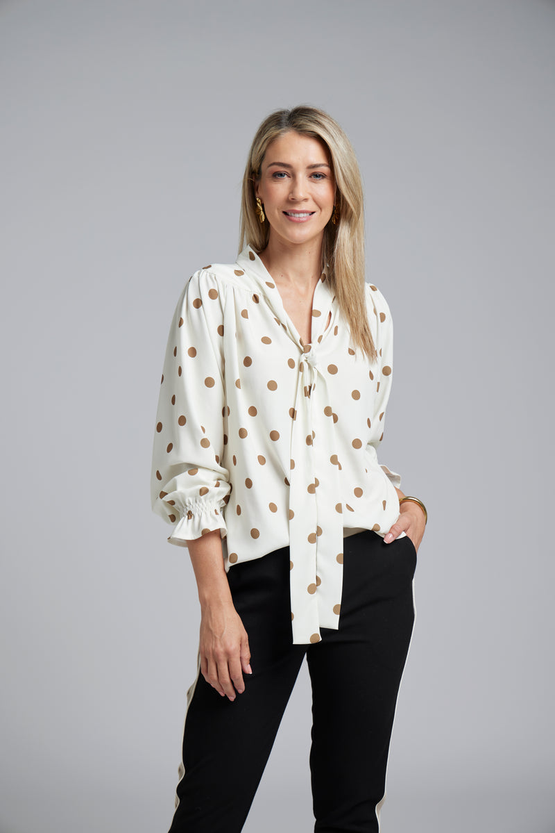 The NES Esme Top by N-E-S – a soft, drapey top with curved hem, available in viscose polka dot georgette or ivory satin back crepe. NZ made.