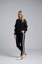 The NES Lilly Piped Pant by N-E-S – a 7/8 straight leg pant with contrast piping, soft stretch fabric and sport-luxe detailing. Comfortable, polished and NZ made.