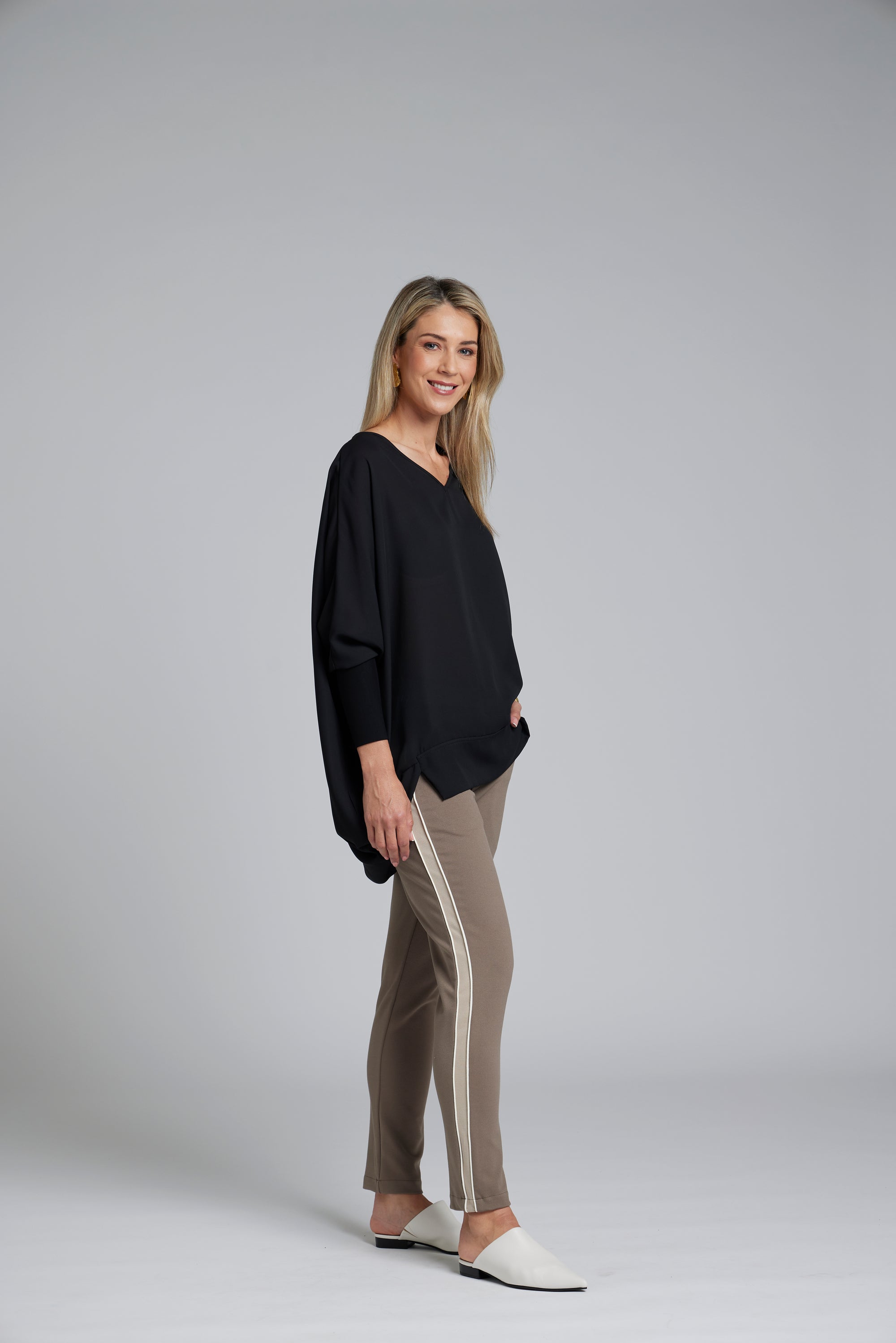 The NES Lilly Piped Pant by N-E-S – a 7/8 straight leg pant with contrast piping, soft stretch fabric and sport-luxe detailing. Comfortable, polished and NZ made.