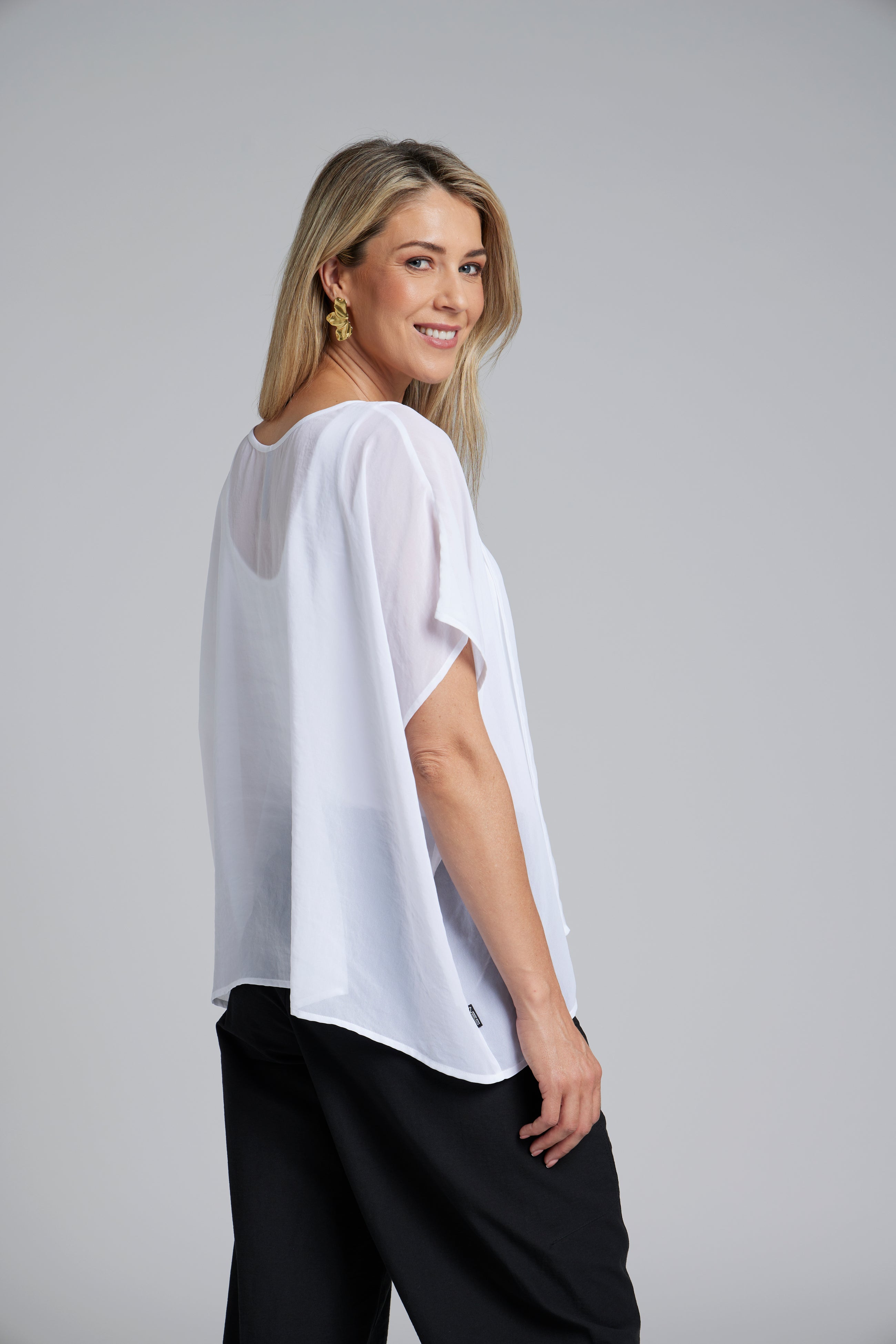 The NES Luna Top – a sheer chiffon top with exposed seams and relaxed fit. Perfect for layering. Lightweight and NZ made.