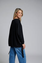 The NES Merino Vanotti Top – a warm merino take on the N-E-S favourite with cigarette sleeves, scoop neck and signature draped hem. NZ made.