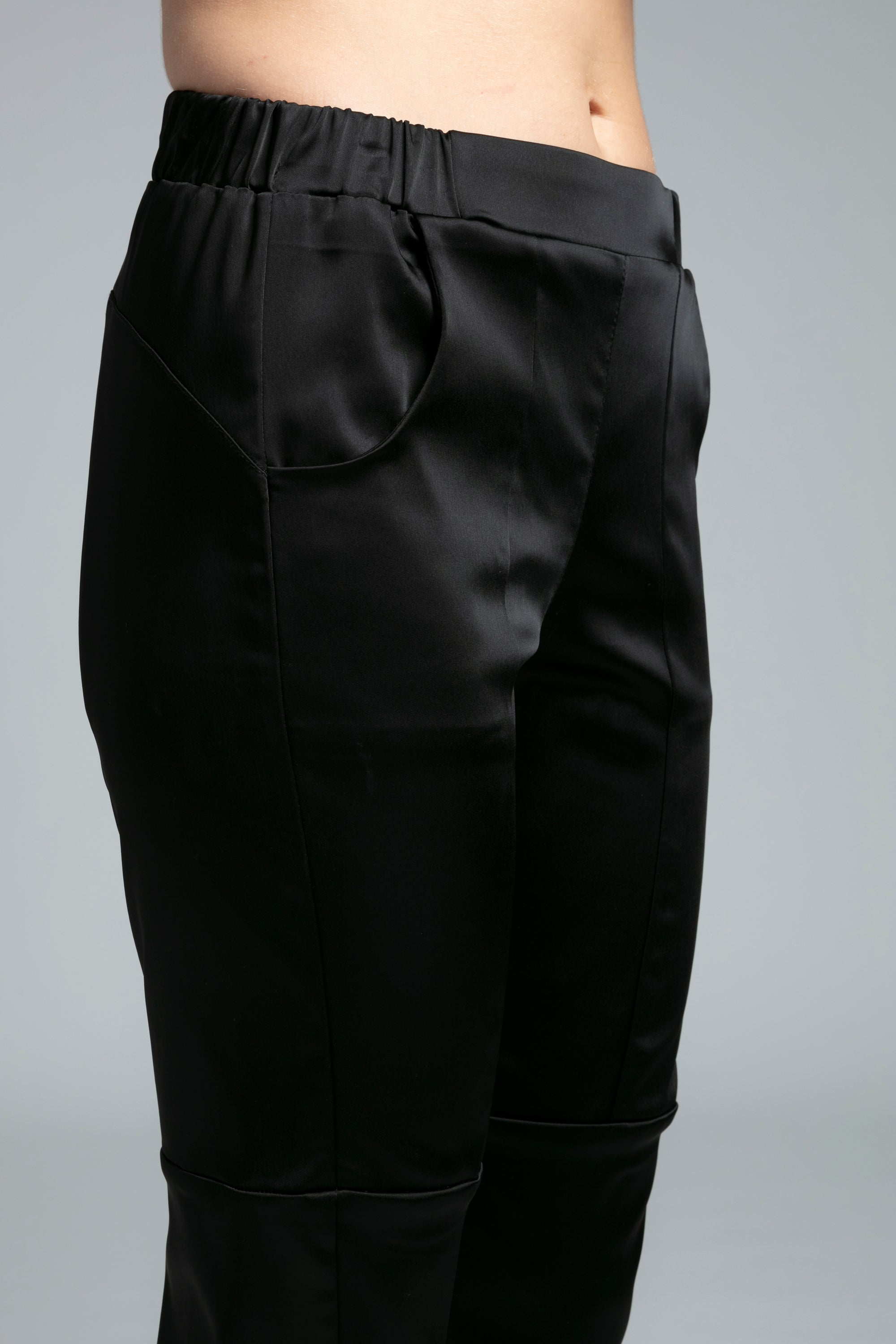 The NES Satin Section Black Pant – a stretch satin pant with elastic waist and panel detail. Elegant, versatile and NZ made.