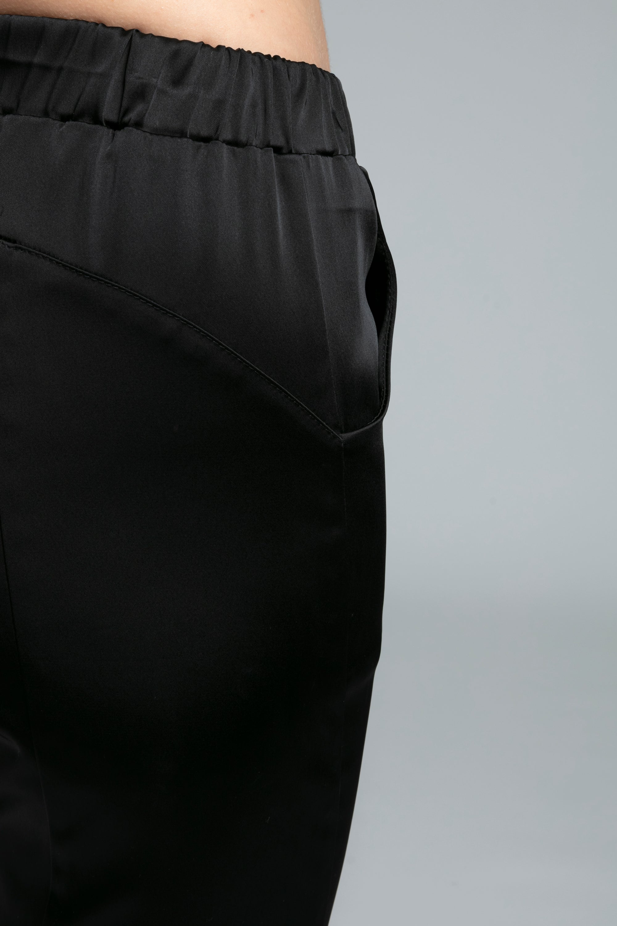 The NES Satin Section Black Pant – a stretch satin pant with elastic waist and panel detail. Elegant, versatile and NZ made.
