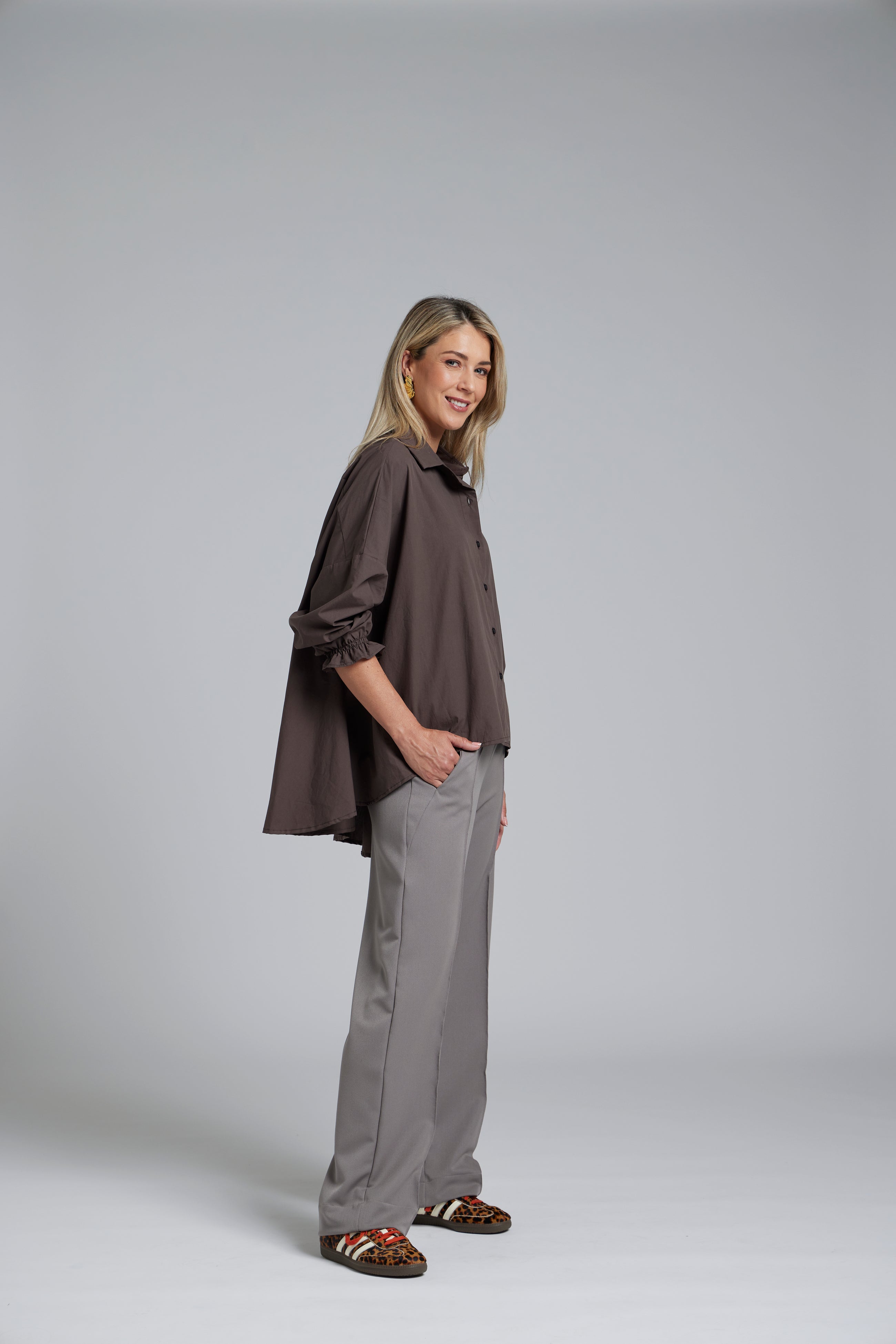 The NES Vey Shirt by N-E-S – a relaxed cotton shirt with 7/8 sleeves, three-row shirred cuffs and soft umbrella silhouette. In stripe or Kenzo Choc. NZ made.