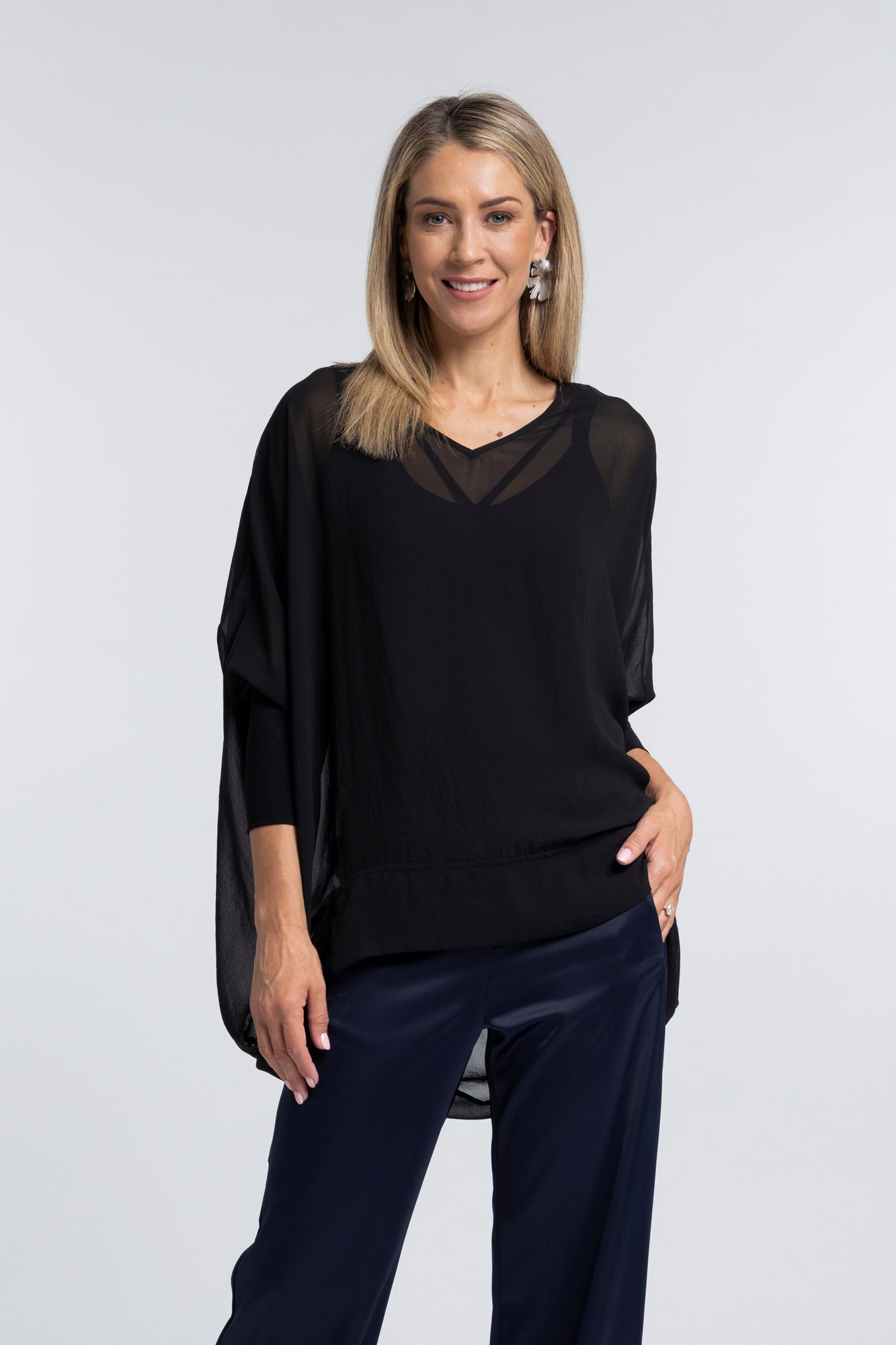 The NES Virtue Tunic – a floaty, relaxed tunic with a scoop neck, curved hem and effortless drape. Perfect layered over a Lattice Singlet. NZ made.