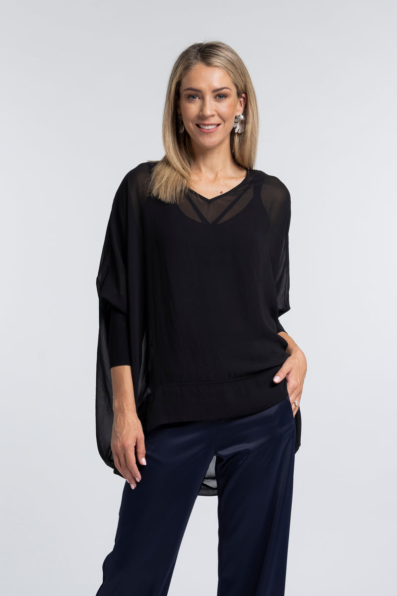 The NES Virtue Tunic – a floaty, relaxed tunic with a scoop neck, curved hem and effortless drape. Perfect layered over a Lattice Singlet. NZ made.
