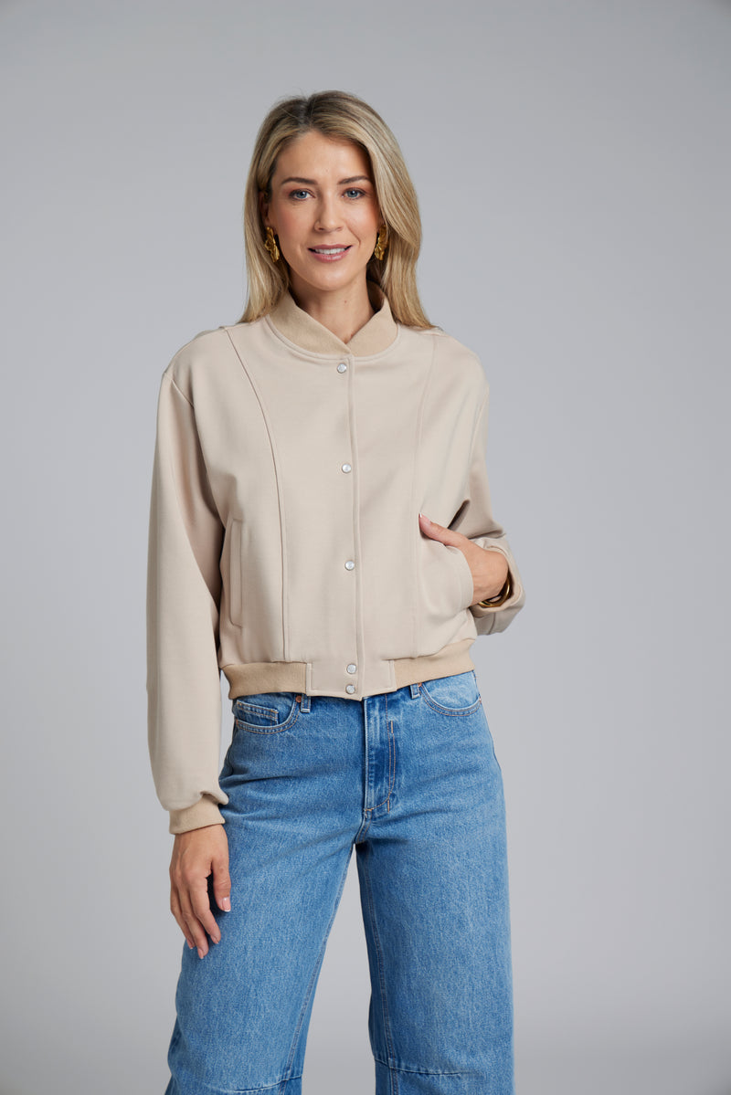 The NES Zadie Bomber by N-E-S – a clean ponte bomber with cotton rib trims and snap domes. Modern, versatile and NZ made. Available in Black or Latte.