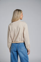 The NES Zadie Bomber by N-E-S – a clean ponte bomber with cotton rib trims and snap domes. Modern, versatile and NZ made. Available in Black or Latte.