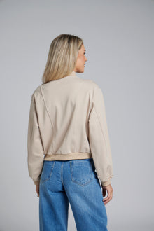 The NES Zadie Bomber by N-E-S – a clean ponte bomber with cotton rib trims and snap domes. Modern, versatile and NZ made. Available in Black or Latte.