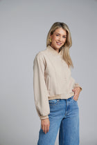 The NES Zadie Bomber by N-E-S – a clean ponte bomber with cotton rib trims and snap domes. Modern, versatile and NZ made. Available in Black or Latte.