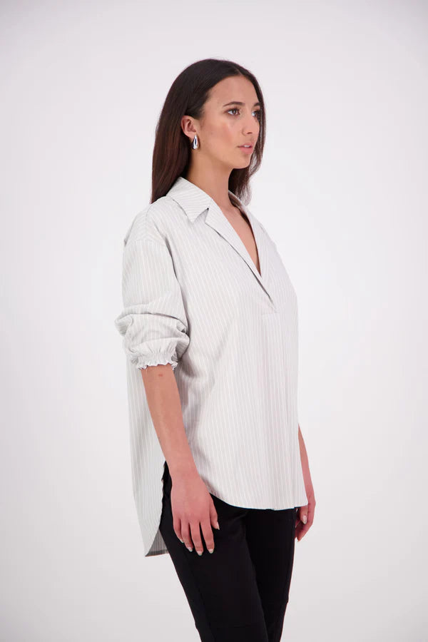 The NES Fara Shirt – a feminine shirt with shirred sleeves, V-neck and back detail. Lightweight, versatile and NZ made.