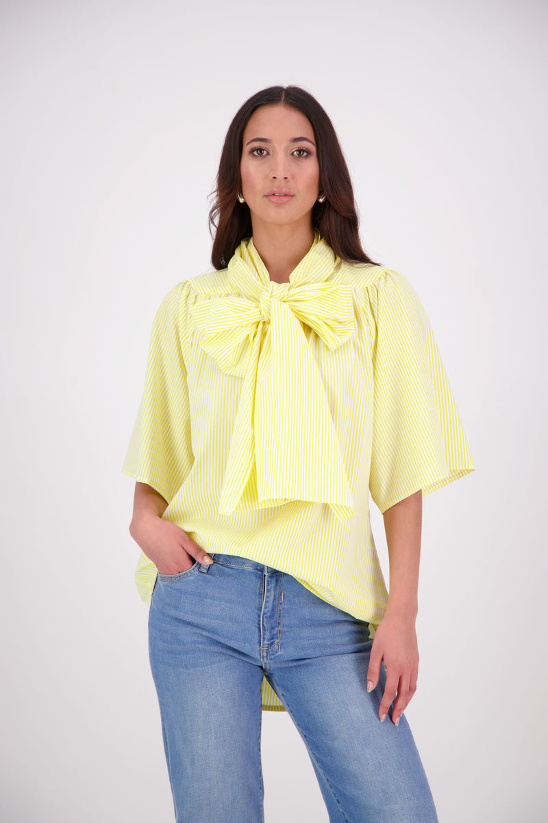 The N-E-S Nova Shirt blends the best of our Ayla, Mon, and Del shirts into one must-have wardrobe piece. Featuring elbow-length sleeves, a soft drop hem at the front and back, and a playful neck tie that can be styled multiple ways—bowed, looped, or reversed and tied at the back. Designed for versatility and charm, the Nova Shirt is a timeless addition to elevate your everyday style.

Our model is 174cm and wear a XS/S (8-10)

Composition: Cotton, bemburg&nbsp;

Designed and Made in New Zealand