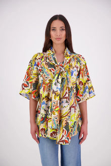 The N-E-S Nova Shirt blends the best of our Ayla, Mon, and Del shirts into one must-have wardrobe piece. Featuring elbow-length sleeves, a soft drop hem at the front and back, and a playful neck tie that can be styled multiple ways—bowed, looped, or reversed and tied at the back. Designed for versatility and charm, the Nova Shirt is a timeless addition to elevate your everyday style.

Our model is 174cm and wear a XS/S (8-10)

Composition: Cotton

Designed and Made in New Zealand