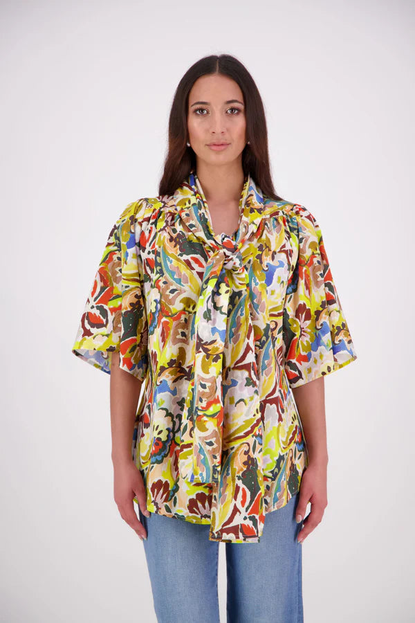 The N-E-S Nova Shirt blends the best of our Ayla, Mon, and Del shirts into one must-have wardrobe piece. Featuring elbow-length sleeves, a soft drop hem at the front and back, and a playful neck tie that can be styled multiple ways—bowed, looped, or reversed and tied at the back. Designed for versatility and charm, the Nova Shirt is a timeless addition to elevate your everyday style.

Our model is 174cm and wear a XS/S (8-10)

Composition: Cotton

Designed and Made in New Zealand