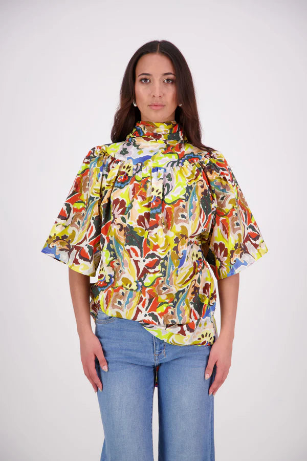 The N-E-S Nova Shirt blends the best of our Ayla, Mon, and Del shirts into one must-have wardrobe piece. Featuring elbow-length sleeves, a soft drop hem at the front and back, and a playful neck tie that can be styled multiple ways—bowed, looped, or reversed and tied at the back. Designed for versatility and charm, the Nova Shirt is a timeless addition to elevate your everyday style.

Our model is 174cm and wear a XS/S (8-10)

Composition: Cotton

Designed and Made in New Zealand