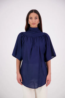 The N-E-S Nova Shirt blends the best of our Ayla, Mon, and Del shirts into one must-have wardrobe piece. Featuring elbow-length sleeves, a soft drop hem at the front and back, and a playful neck tie that can be styled multiple ways—bowed, looped, or reversed and tied at the back. Designed for versatility and charm, the Nova Shirt is a timeless addition to elevate your everyday style.
Our model is 174cm and wear a XS/S (8-10)
Composition: Cotton voile
Designed in New Zealand