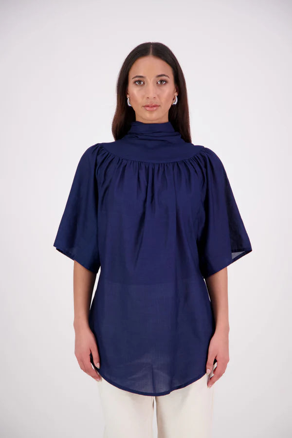 The N-E-S Nova Shirt blends the best of our Ayla, Mon, and Del shirts into one must-have wardrobe piece. Featuring elbow-length sleeves, a soft drop hem at the front and back, and a playful neck tie that can be styled multiple ways—bowed, looped, or reversed and tied at the back. Designed for versatility and charm, the Nova Shirt is a timeless addition to elevate your everyday style.
Our model is 174cm and wear a XS/S (8-10)
Composition: Cotton voile
Designed in New Zealand