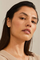 The Opal seashell earrings are the ultimate micro studs
With delicate white micro beads
Measures 8 mm
An elegant touch
Made from 81% recycled material
Available in Gold-plated &amp; Silver-plated