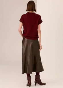 POL Astor Turtleneck Tee in a Yak and extrafine Merino blend, featuring a ribbed mock neck, dropped armholes and cap sleeves, finished with a relaxed fit and ribbed hem, available in Pebble and Wine