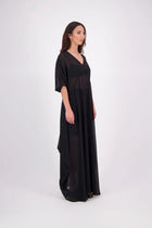 The N-E-S Remi Dress is a dreamy maxi style crafted in sheer chiffon, designed to be worn over a N-E-S Lattice Slip. Featuring floaty kimono sleeves, a soft V-neckline with a scoop back (or wear it reversed), and a slight barrel hem created by unique side seam panels that flow from the centre front. Finished at lower calf length for graceful movement—this dress brings effortless elegance to any occasion.
Our model is 174cm and wears XS/S (8-10)
Composition: polyester Chiffon
Designed in New Zealand