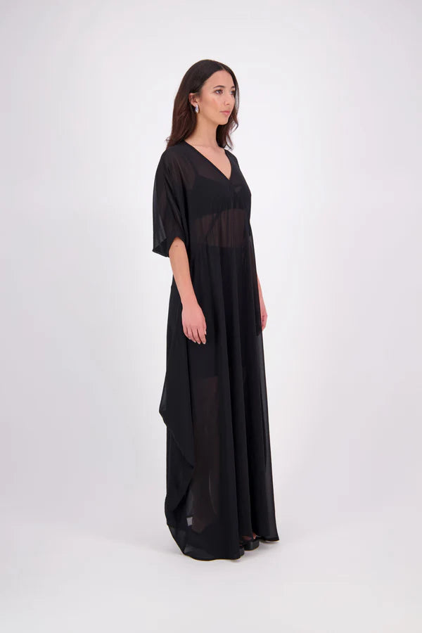 The N-E-S Remi Dress is a dreamy maxi style crafted in sheer chiffon, designed to be worn over a N-E-S Lattice Slip. Featuring floaty kimono sleeves, a soft V-neckline with a scoop back (or wear it reversed), and a slight barrel hem created by unique side seam panels that flow from the centre front. Finished at lower calf length for graceful movement—this dress brings effortless elegance to any occasion.
Our model is 174cm and wears XS/S (8-10)
Composition: polyester Chiffon
Designed in New Zealand
