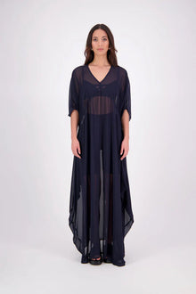 The N-E-S Remi Dress is a dreamy maxi style crafted in sheer chiffon, designed to be worn over a N-E-S Lattice Slip. Featuring floaty kimono sleeves, a soft V-neckline with a scoop back (or wear it reversed), and a slight barrel hem created by unique side seam panels that flow from the centre front. Finished at lower calf length for graceful movement—this dress brings effortless elegance to any occasion.
Our model is 174cm and wears XS/S (8-10)
Composition: polyester Chiffon
Designed in New Zealand