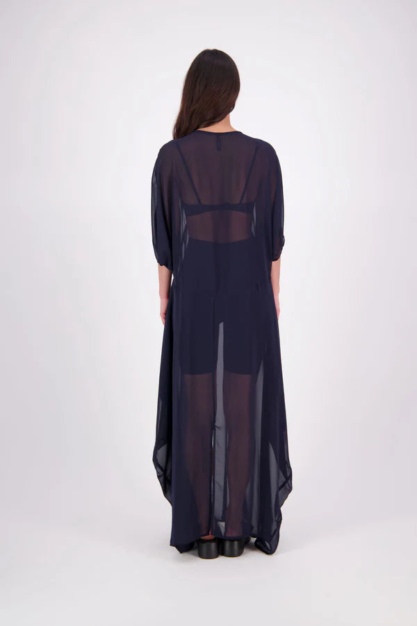 The N-E-S Remi Dress is a dreamy maxi style crafted in sheer chiffon, designed to be worn over a N-E-S Lattice Slip. Featuring floaty kimono sleeves, a soft V-neckline with a scoop back (or wear it reversed), and a slight barrel hem created by unique side seam panels that flow from the centre front. Finished at lower calf length for graceful movement—this dress brings effortless elegance to any occasion.
Our model is 174cm and wears XS/S (8-10)
Composition: polyester Chiffon
Designed in New Zealand