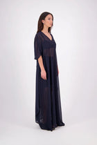 The N-E-S Remi Dress is a dreamy maxi style crafted in sheer chiffon, designed to be worn over a N-E-S Lattice Slip. Featuring floaty kimono sleeves, a soft V-neckline with a scoop back (or wear it reversed), and a slight barrel hem created by unique side seam panels that flow from the centre front. Finished at lower calf length for graceful movement—this dress brings effortless elegance to any occasion.
Our model is 174cm and wears XS/S (8-10)
Composition: polyester Chiffon
Designed in New Zealand
