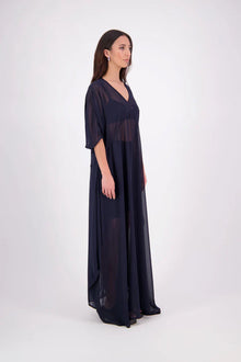 The N-E-S Remi Dress is a dreamy maxi style crafted in sheer chiffon, designed to be worn over a N-E-S Lattice Slip. Featuring floaty kimono sleeves, a soft V-neckline with a scoop back (or wear it reversed), and a slight barrel hem created by unique side seam panels that flow from the centre front. Finished at lower calf length for graceful movement—this dress brings effortless elegance to any occasion.
Our model is 174cm and wears XS/S (8-10)
Composition: polyester Chiffon
Designed in New Zealand