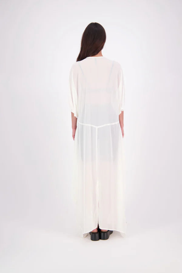 The N-E-S Remi Dress is a dreamy maxi style crafted in sheer chiffon, designed to be worn over a N-E-S Lattice Slip. Featuring floaty kimono sleeves, a soft V-neckline with a scoop back (or wear it reversed), and a slight barrel hem created by unique side seam panels that flow from the centre front. Finished at lower calf length for graceful movement—this dress brings effortless elegance to any occasion.
Our model is 174cm and wears XS/S (8-10)
Composition: polyester Chiffon
Designed in New Zealand