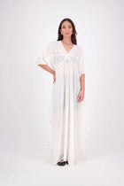 The N-E-S Remi Dress is a dreamy maxi style crafted in sheer chiffon, designed to be worn over a N-E-S Lattice Slip. Featuring floaty kimono sleeves, a soft V-neckline with a scoop back (or wear it reversed), and a slight barrel hem created by unique side seam panels that flow from the centre front. Finished at lower calf length for graceful movement—this dress brings effortless elegance to any occasion.
Our model is 174cm and wears XS/S (8-10)
Composition: polyester Chiffon
Designed in New Zealand