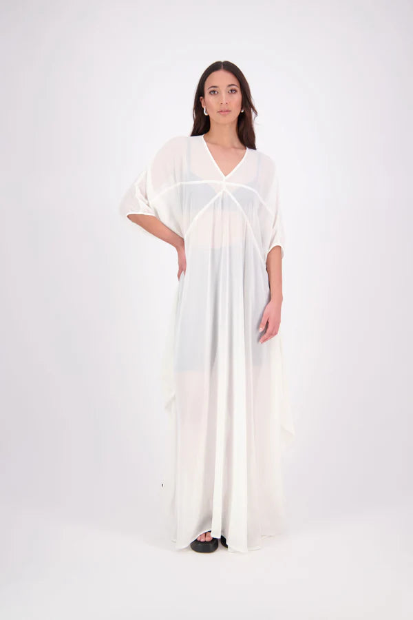 The N-E-S Remi Dress is a dreamy maxi style crafted in sheer chiffon, designed to be worn over a N-E-S Lattice Slip. Featuring floaty kimono sleeves, a soft V-neckline with a scoop back (or wear it reversed), and a slight barrel hem created by unique side seam panels that flow from the centre front. Finished at lower calf length for graceful movement—this dress brings effortless elegance to any occasion.
Our model is 174cm and wears XS/S (8-10)
Composition: polyester Chiffon
Designed in New Zealand