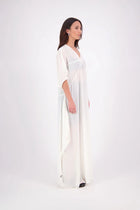 The N-E-S Remi Dress is a dreamy maxi style crafted in sheer chiffon, designed to be worn over a N-E-S Lattice Slip. Featuring floaty kimono sleeves, a soft V-neckline with a scoop back (or wear it reversed), and a slight barrel hem created by unique side seam panels that flow from the centre front. Finished at lower calf length for graceful movement—this dress brings effortless elegance to any occasion.
Our model is 174cm and wears XS/S (8-10)
Composition: polyester Chiffon
Designed in New Zealand