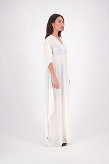 The N-E-S Remi Dress is a dreamy maxi style crafted in sheer chiffon, designed to be worn over a N-E-S Lattice Slip. Featuring floaty kimono sleeves, a soft V-neckline with a scoop back (or wear it reversed), and a slight barrel hem created by unique side seam panels that flow from the centre front. Finished at lower calf length for graceful movement—this dress brings effortless elegance to any occasion.
Our model is 174cm and wears XS/S (8-10)
Composition: polyester Chiffon
Designed in New Zealand