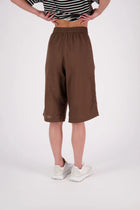 The N-E-S Rita Short is an easy update to our classic Gin Short, crafted in a breathable linen-cotton blend. Featuring a single front leg pleat for subtle shape, angled front pockets, and an elasticated back waistband for comfort. A decorative front drawcord adds detail, with a length finishing just below the knee—perfect for relaxed yet polished summer dressing.

White colourway has a 1/2 liner in a cotton voile
Our model is 174cm and wear a XS (8)
Composition: Linen Cotton
Designed and Made in New Zealand