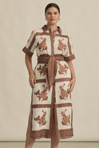 The roam dress is cut in airy linen, finished with thoughtful trim and a side split for relaxed movement. With an exclusive print crafted in luxurious and timeless mocha hues this makes the roam dress perfect for resort styling or everyday luxury.

crisp collar and covered placket deliver refined finish
custom zk exclusive coffee collage print
wide self-tie belt for tailored shape
side split and relaxed fit offer comfort and movement
finished hem and sleeve trim for elevated detail
vacation-ready and trans-
