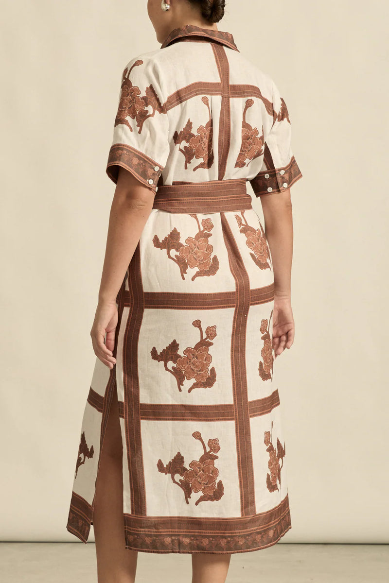 The roam dress is cut in airy linen, finished with thoughtful trim and a side split for relaxed movement. With an exclusive print crafted in luxurious and timeless mocha hues this makes the roam dress perfect for resort styling or everyday luxury.

crisp collar and covered placket deliver refined finish
custom zk exclusive coffee collage print
wide self-tie belt for tailored shape
side split and relaxed fit offer comfort and movement
finished hem and sleeve trim for elevated detail
vacation-ready and trans-