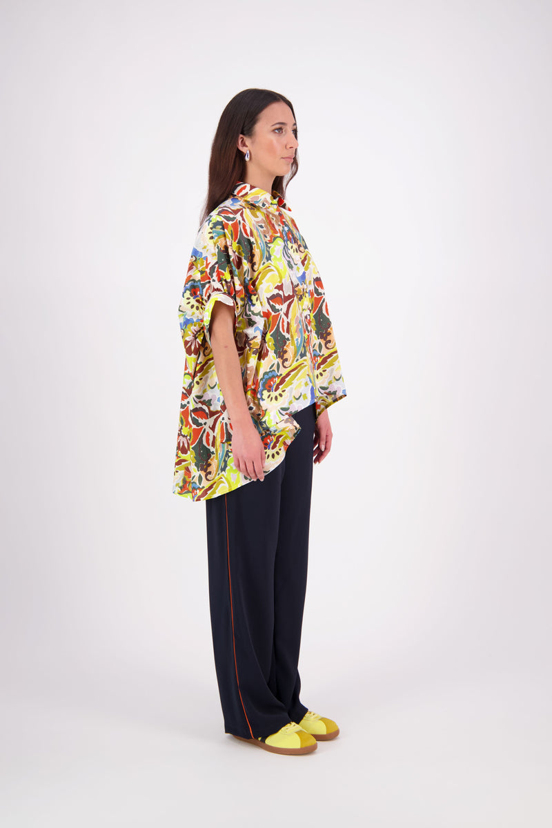 We’ve had some fun with our NES Gin Pants, adding a contrast side seam piping detail for a stylish twist on a classic design. These pants feature a flattering, classic cut that’s perfect for both dressing up and down, making them an ideal work pant and an effortless everyday style. With a flat front, covered elasticated back, and flattering angled pockets, they offer both comfort and sophistication.
Composition: 100% Polyester
Designed & Made in New Zealand