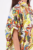 Ryn Shirt – Effortless Volume &amp; Soft Structure

The N-E-S Ryn Shirt is a COTTON SHIRT modern take on a classic, crafted in breathable cotton. With its umbrella-style silhouette, it features a centre front button-down placket, kimono-style sleeves gathered into soft cuffs, and a slight high-low hem. Easy to style back with pants, shorts, or skirts—this is your go-to shirt for relaxed yet elevated dressing.