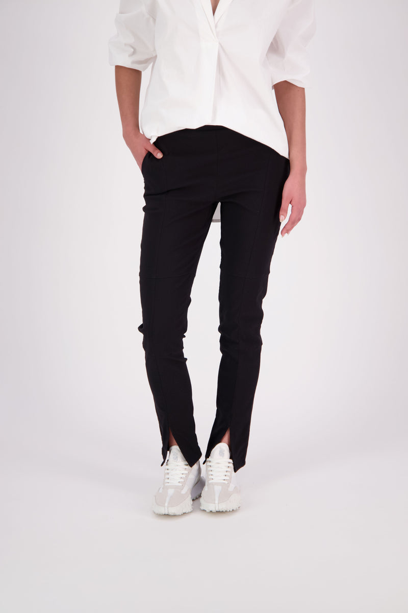 Sector Split Pant – A Fresh Take on a NES Classic

An evolution of our popular Section Pant, the N-E-S Sector Split Pant features signature panel detailing with a modern hem split for added edge. Designed in stretch twill for all-day comfort, it offers a flat front panel with a ¾ elasticated waistband wrapping into the front for a smooth, flattering fit. A versatile staple with everyday ease and tailored appeal.
