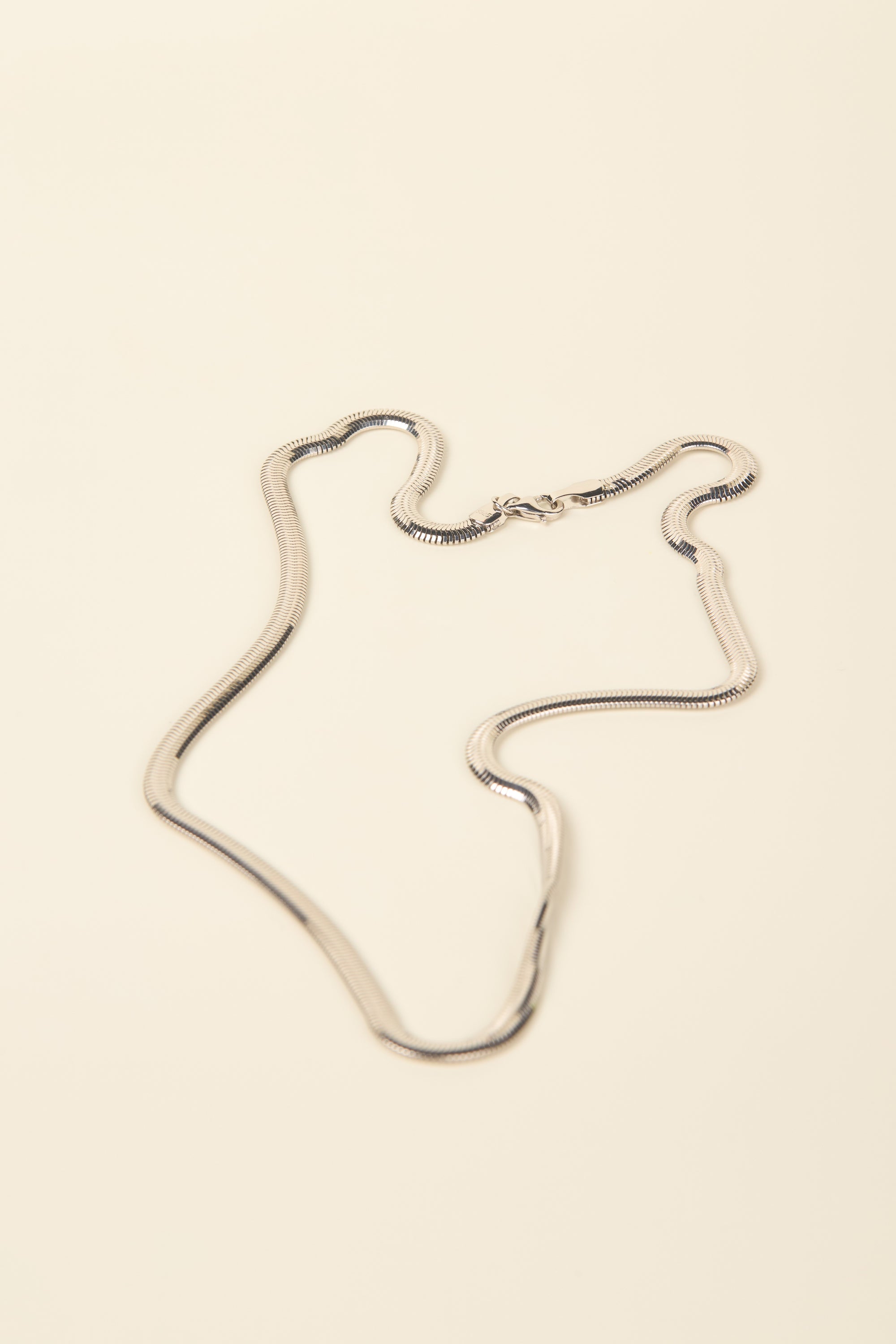 ALTA JEWELLERY | SNAKEY CHAIN NECKLACE
Sleek, modern and endlessly versatile - the Alta Snakey Chain Necklace is designed to elevate your everyday style. Crafted in premium sterling silver, this fluid chain catches the light with every movement. For a warmer finish, choose the sterling silver with 18k gold vermeil option.