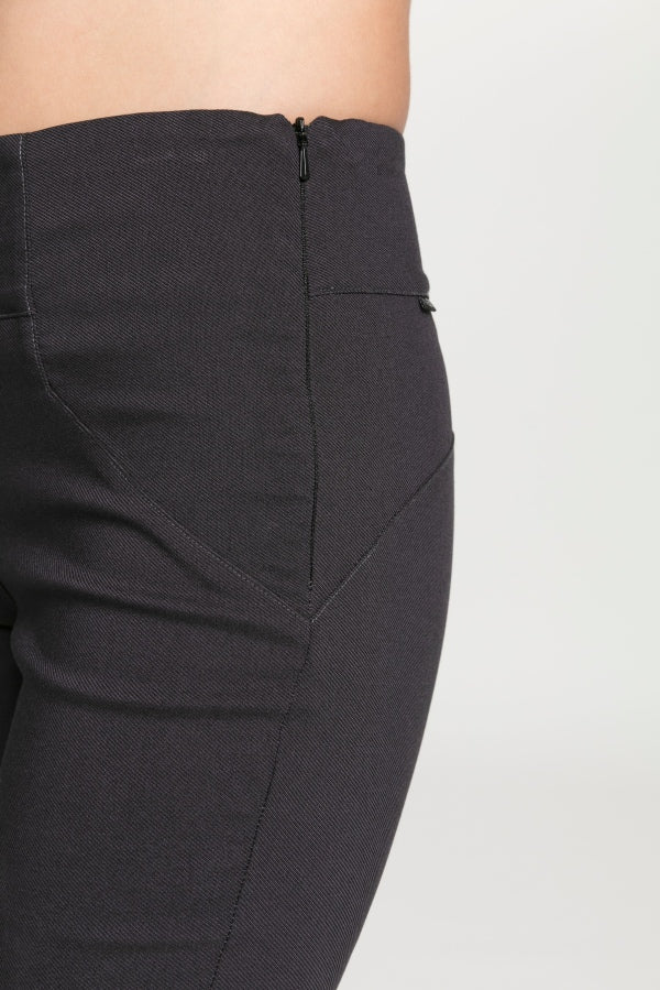 The NES Skinnie Minnies Pant is your go-to for sleek, everyday style with a modern edge. Crafted from the same super stretchy twill fabric you love, these pants are all about a flattering fit and effortless comfort. Featuring a cigarette-style slim leg, flat waistband, and a concealed side seam zip, the Skinnie Minnies offer a streamlined silhouette that's both polished and wearable.