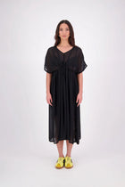 Tara Dress – Effortless, Floaty &amp; Reversible

The N-E-S Tara Dress is a one-size, oversized silhouette made from lightweight chiffon for a breezy, elegant drape. Featuring cap sleeves, a front yoke, and a drawcord at the back, this style can be worn reversed for added versatility. Finished with a soft V-neck at the back or front and a hem that falls just below the knees, it’s the perfect throw-on piece for effortless summer dressing.