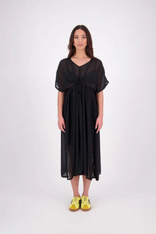 Tara Dress – Effortless, Floaty &amp; Reversible

The N-E-S Tara Dress is a one-size, oversized silhouette made from lightweight chiffon for a breezy, elegant drape. Featuring cap sleeves, a front yoke, and a drawcord at the back, this style can be worn reversed for added versatility. Finished with a soft V-neck at the back or front and a hem that falls just below the knees, it’s the perfect throw-on piece for effortless summer dressing.