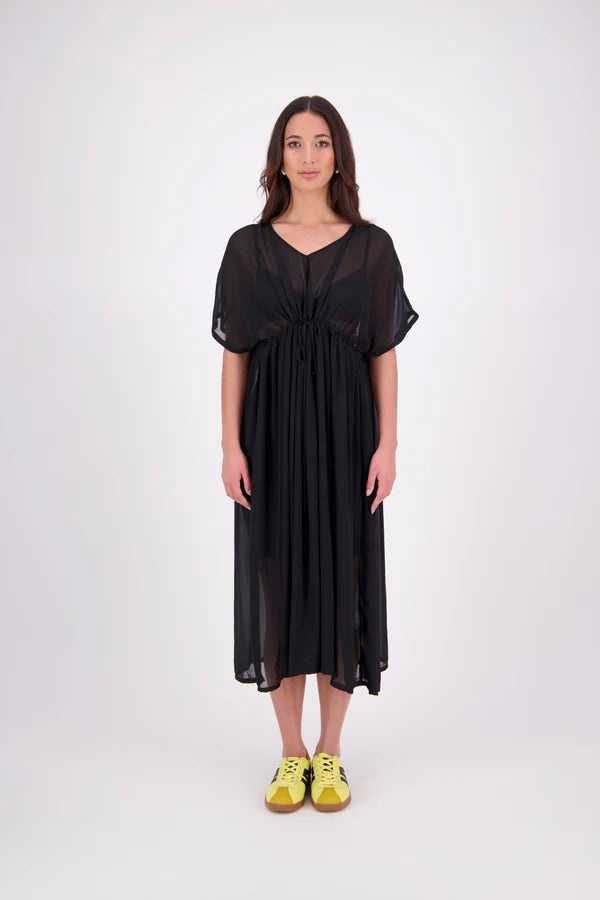 Tara Dress – Effortless, Floaty &amp; Reversible

The N-E-S Tara Dress is a one-size, oversized silhouette made from lightweight chiffon for a breezy, elegant drape. Featuring cap sleeves, a front yoke, and a drawcord at the back, this style can be worn reversed for added versatility. Finished with a soft V-neck at the back or front and a hem that falls just below the knees, it’s the perfect throw-on piece for effortless summer dressing.