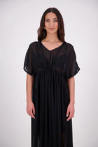 Tara Dress – Effortless, Floaty &amp; Reversible

The N-E-S Tara Dress is a one-size, oversized silhouette made from lightweight chiffon for a breezy, elegant drape. Featuring cap sleeves, a front yoke, and a drawcord at the back, this style can be worn reversed for added versatility. Finished with a soft V-neck at the back or front and a hem that falls just below the knees, it’s the perfect throw-on piece for effortless summer dressing.