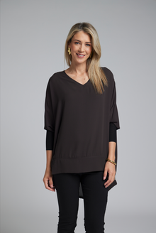 The N-E-S Virtue Tunic – a floaty, relaxed tunic with a scoop neck, curved hem and effortless drape. Perfect layered over a Lattice Singlet. NZ made.