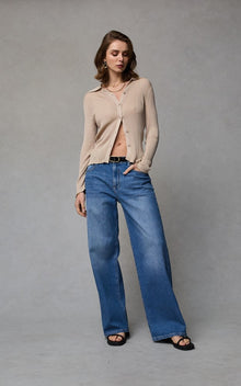 Dricoper Zelda jeans in Rodeo Blue, designed with a relaxed baggy fit, mid-to-high rise waist, and wide loose legs that fall to the floor for a laid-back ’90s-inspired look.